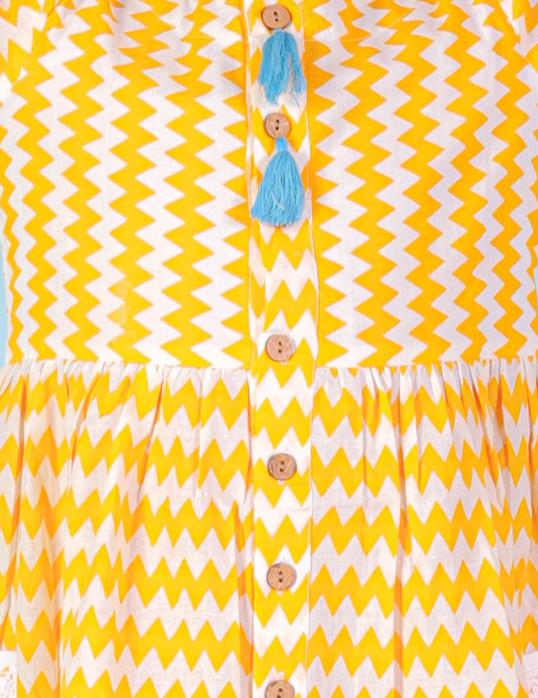 Girls printed striper cotton dress with tassles and Rick rak lace