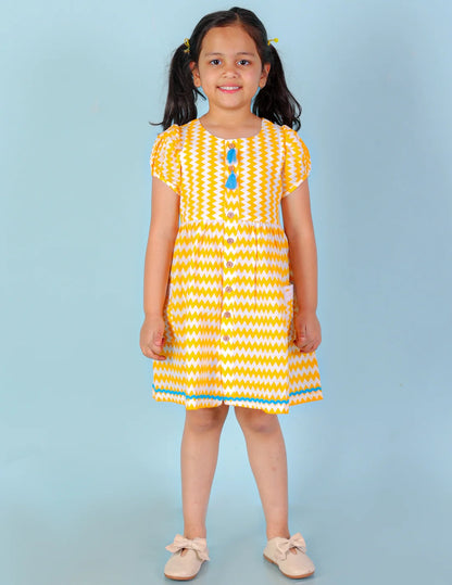 Girls printed striper cotton dress with tassles and Rick rak lace